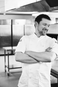Black and white image of Tom Beauchamp, Development Chef at Sodexo